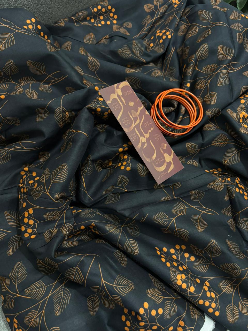 Black lawn suit with orange print 2 piece summer collection Pakistan